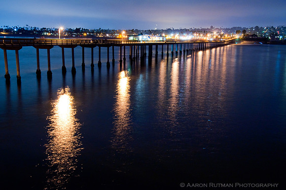 Ocean Beach pier at night green